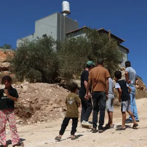 Israeli soldiers evacuate Palestinians besieged by settlers