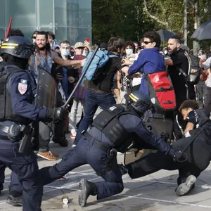 French police fire tear gas at school protesters