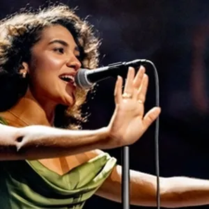 Olivia Dean in Bill Withers Copycat Row