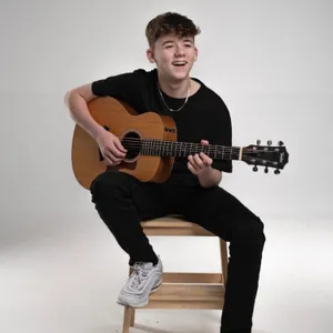 Lewis Simons . The 14 year old musical singer, songwriter and guitarist superstar